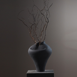 oriental ceramic flower vessel: loneliness blossoms