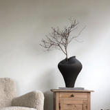 oriental ceramic flower vessel: loneliness blossoms